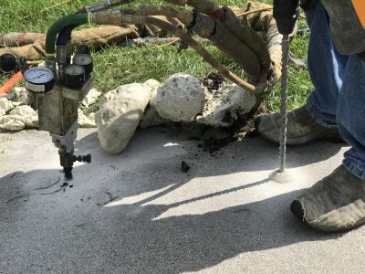 Concrete Mudjacking For Sunken Patios And Steps